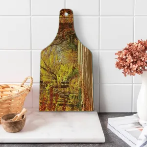 Ambesonne Fall Cutting Board, Scenic View Outdoors Empty Roadway Surrounded with Deciduous Trees Image, Decorative Tempered Glass Cutting and Serving Board, Wine Bottle Shape, Redwood Yellow Orange