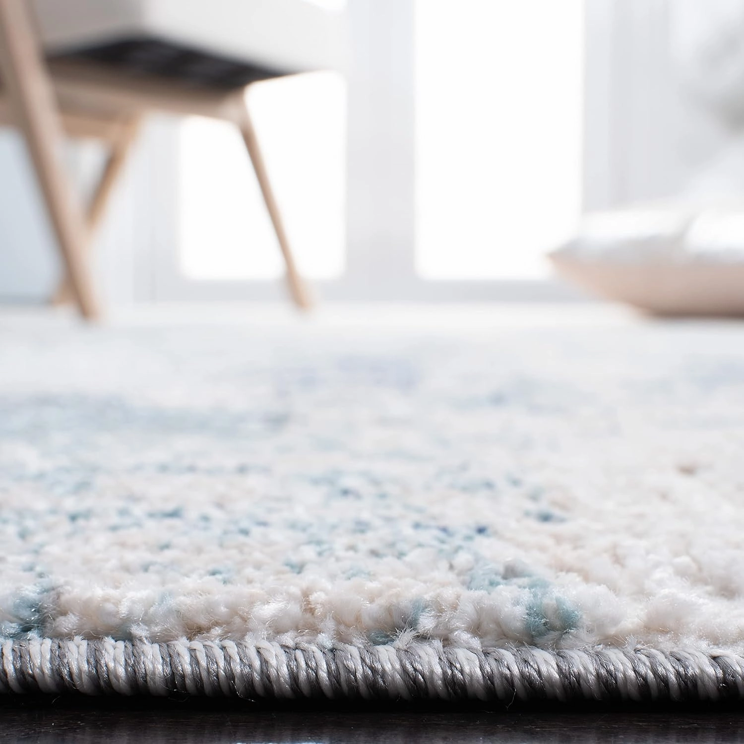 SAFAVIEH Aston Collection Area Rug - 6' x 9', Ivory & Blue, Modern Abstract Design, Non-Shedding & Easy Care, Ideal for High Traffic Areas in Living Room, Bedroom (ASN710M)