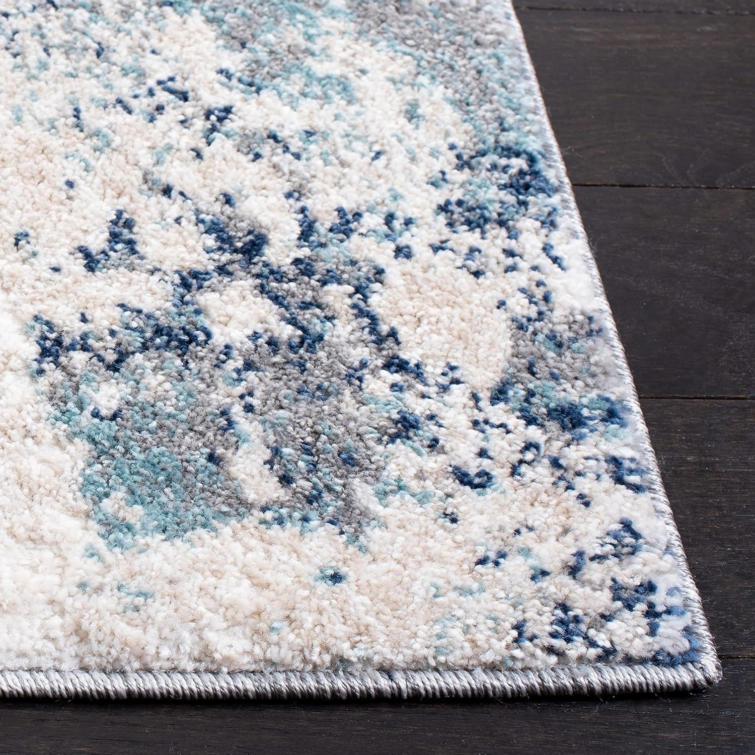 SAFAVIEH Aston Collection Area Rug - 6' x 9', Ivory & Blue, Modern Abstract Design, Non-Shedding & Easy Care, Ideal for High Traffic Areas in Living Room, Bedroom (ASN710M)