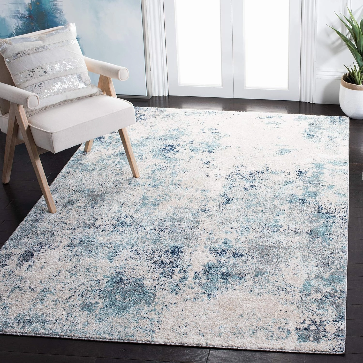 SAFAVIEH Aston Collection Area Rug - 6' x 9', Ivory & Blue, Modern Abstract Design, Non-Shedding & Easy Care, Ideal for High Traffic Areas in Living Room, Bedroom (ASN710M)