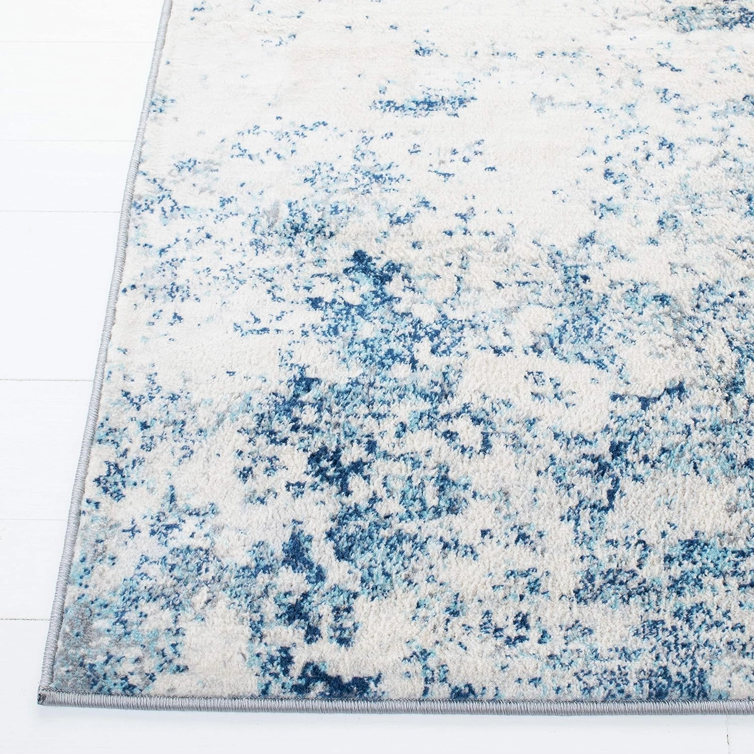 SAFAVIEH Brentwood Collection Area Rug - 9' x 12', Ivory & Navy, Modern Abstract Design, Non-Shedding & Easy Care, Ideal for High Traffic Areas in Living Room, Bedroom (BNT822B)