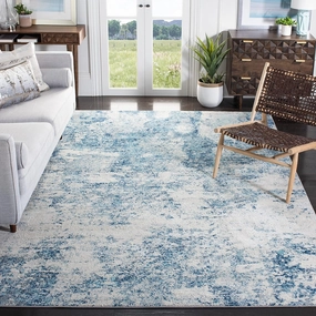SAFAVIEH Brentwood Collection Area Rug - 9' x 12', Ivory & Navy, Modern Abstract Design, Non-Shedding & Easy Care, Ideal for High Traffic Areas in Living Room, Bedroom (BNT822B)