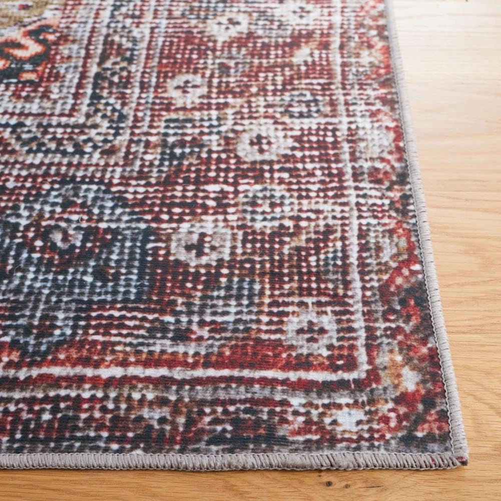 SAFAVIEH Washable Rug Tucson Collection - 9' x 12', Navy & Rust, Slip Resistant, Ideal for High Traffic Areas in Living Room, Bedroom, Home Office, Dining Space (TSN130N-9)