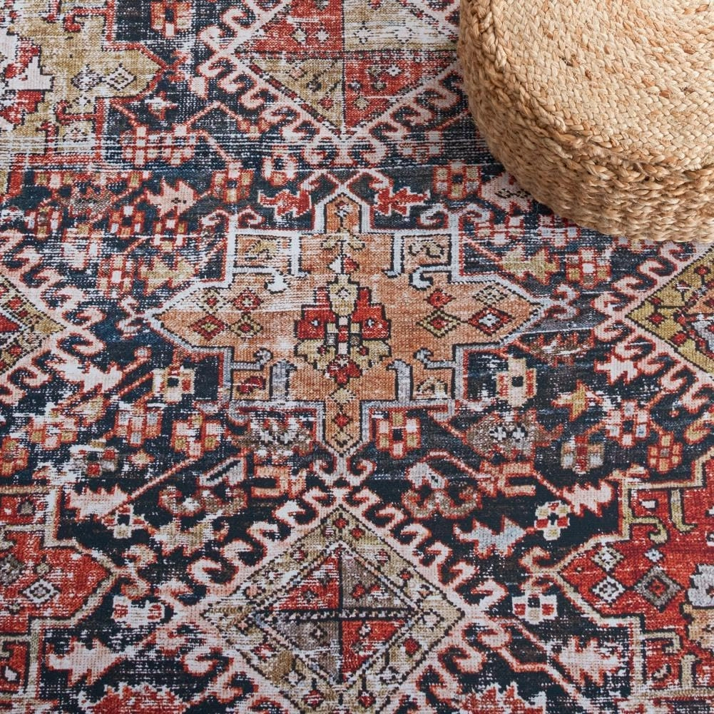 SAFAVIEH Washable Rug Tucson Collection - 9' x 12', Navy & Rust, Slip Resistant, Ideal for High Traffic Areas in Living Room, Bedroom, Home Office, Dining Space (TSN130N-9)